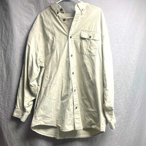 This is a long sleeved khaki shirt by Columbia sportswear company.
